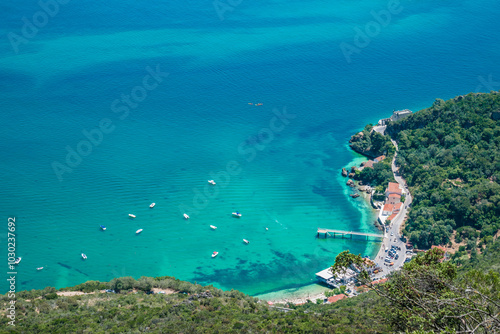 Viewpoint on cliff to idyllic Portinho da Arrábida beach with turquoise water, Setúbal PORTUGAL