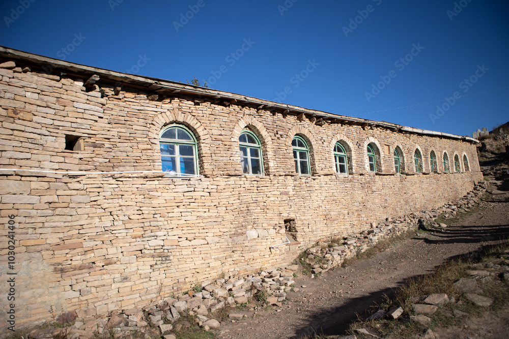 An old brick building in a former village in the mountains in Dagestan in the Caucasus An old brick building in a former village in the mountains in Dagestan in the Caucasus