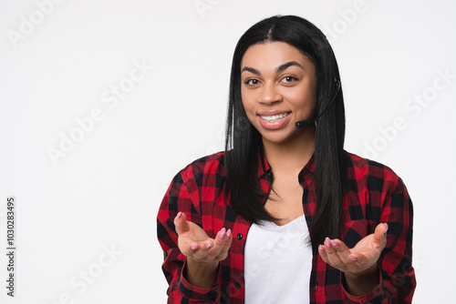 Close up portrait of friendly smiling black afro woman female consultant manager worker of a call canter hot line costumer support in headset isolated on white background. Ready to help