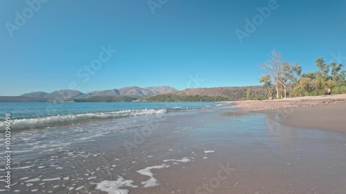 Wallpaper Mural Waves flow onto sunny empty tropical sandy Mediterranean Greek beach Torontodigital.ca