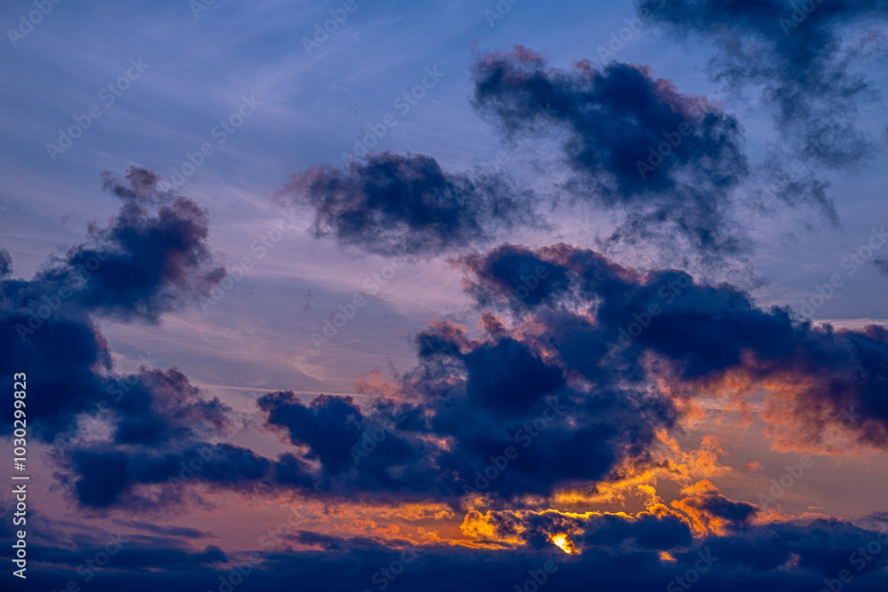 Colourful golden sunset with lively clouds. Colourful golden sunset with lively clouds.