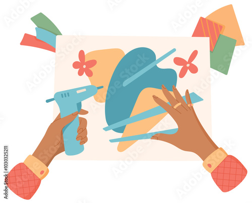 Hand holding hot glue gun sticker for craft activity with colorful supplies and materials on desk. Children engage in creative making during workshop. Concept of diy, craftwork, and creative hobbies.