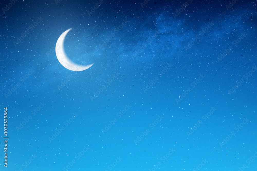 A crescent moon is shining brightly in the night sky. The stars are scattered throughout the sky A crescent moon is shining brightly in the night sky. The stars are scattered throughout the sky
