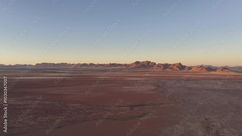 Aerial drone view of a tourist campsite in a beautiful sunrise in Namibia, Africa Aerial drone view of a tourist campsite in a beautiful sunrise in Namibia, Africa