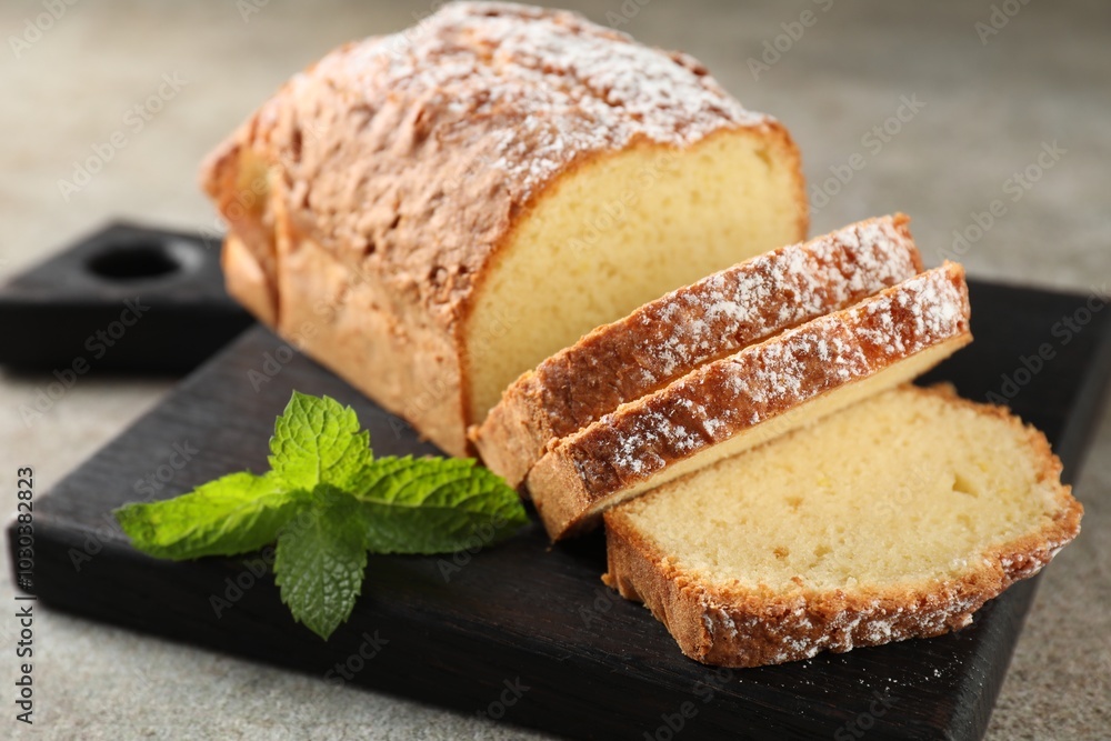 Freshly baked sponge cake on light grey table, closeup Freshly baked sponge cake on light grey table, closeup