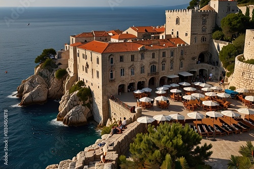 Dubrovnik, Croatia - Sept. 9, 2023: Buza Bar, set on the steep cliffside of Dubrovnik's historic fortified Old Town, is famous for its cocktails, stunning views, sunbathers and fearless cliff jumpers.