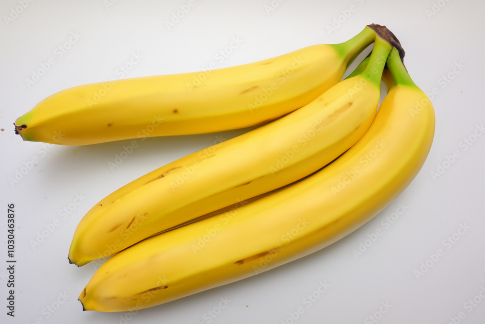 Bananas and other fruits in a gray . banana healthy food concept. tropical fruits on a gray with bananas in yellow. tropical fruits in a gray and yellow with a banana lifestyle on the side. Bananas and other fruits in a gray . banana healthy food concept. tropical fruits on a gray with bananas in yellow. tropical fruits in a gray and yellow with a banana lifestyle on the side.