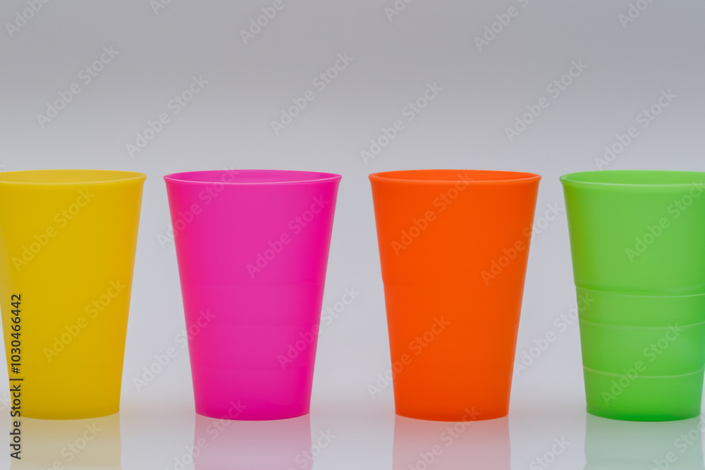 White with cups and plastic. cup grey healthy concept. a white and gray cup on a white . a white cup with a lifestyle colored on it. White with cups and plastic. cup grey healthy concept. a white and gray cup on a white . a white cup with a lifestyle colored on it.