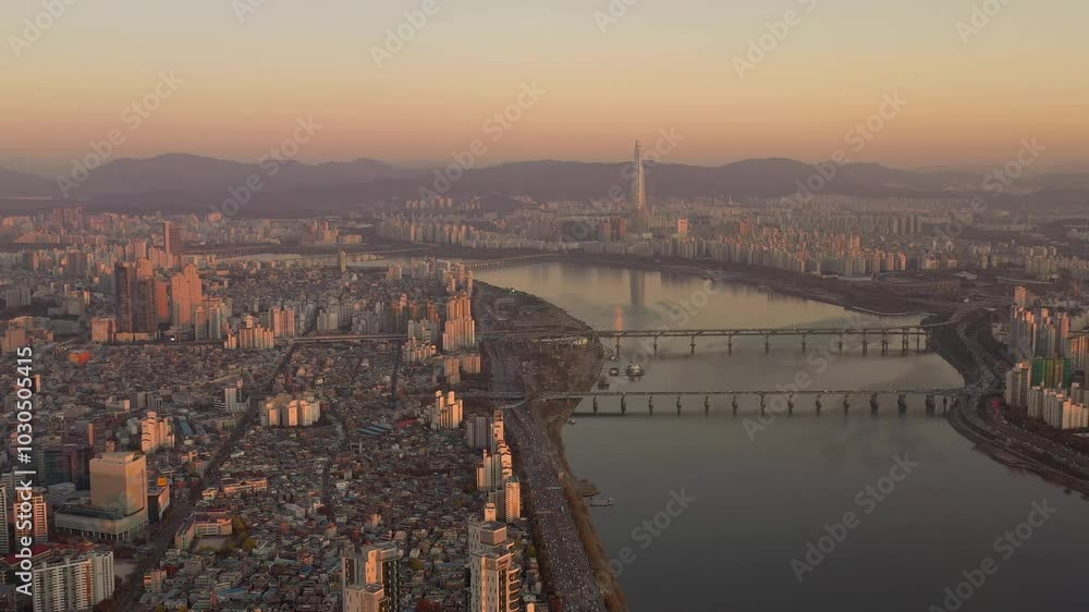 SEOUL, SOUTH KOREA - SEPTEMBER 9, 2024: Captivating skyline view over Han River and cityscape at twilight. SEOUL, SOUTH KOREA - SEPTEMBER 9, 2024: Captivating skyline view over Han River and cityscape at twilight.