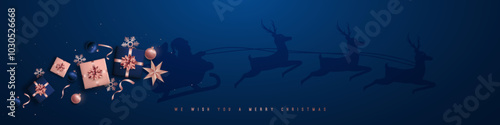 Sleigh silhouette with gifts on navy backdrop