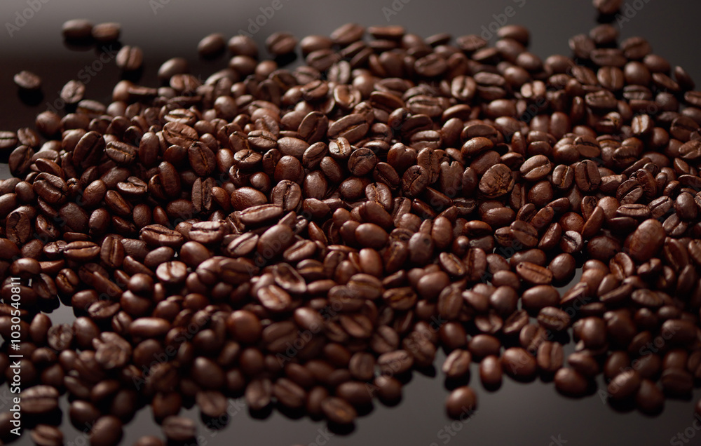 Coffee, organic and roast with background of beans for industry, supply and natural production. Sustainability manufacturing and texture with seeds for espresso, granules and caffeine beverage Coffee, organic and roast with background of beans for industry, supply and natural production. Sustainability manufacturing and texture with seeds for espresso, granules and caffeine beverage