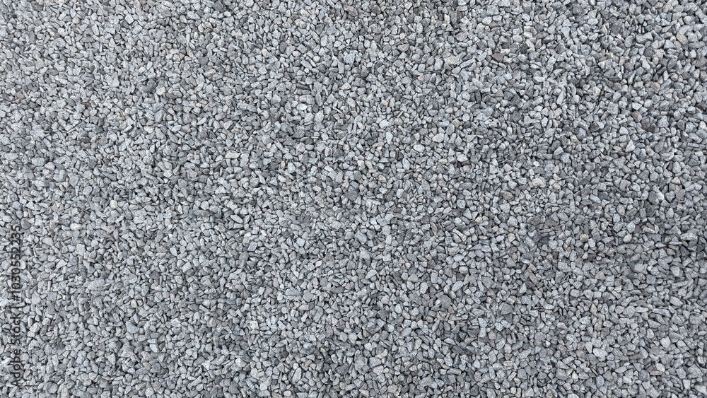 Texture from a pile of grey crushed stone. Texture from a pile of grey crushed stone.