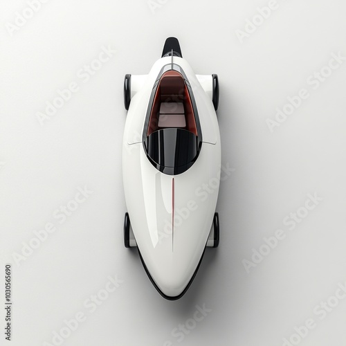 Futuristic white electric vehicle concept viewed from above against a white background