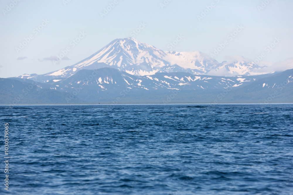 Russia Kuril Islands view from the sea on a sunny summer day Russia Kuril Islands view from the sea on a sunny summer day