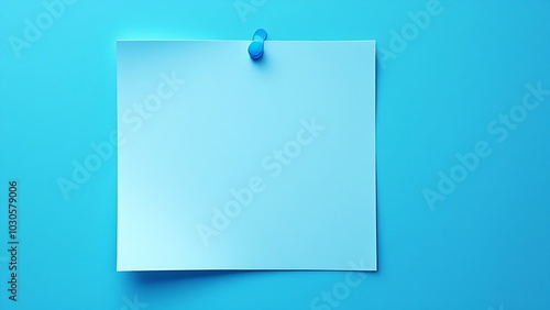 a blank white sheet of paper pinned with a blue pushpin to a blue surface, presenting a simple and clean composition