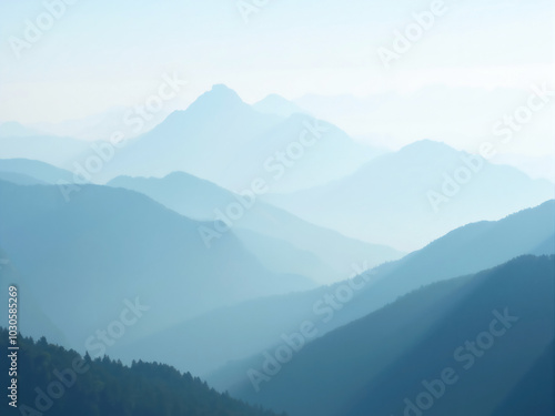 Blue mountain range fading into the distance at sunset