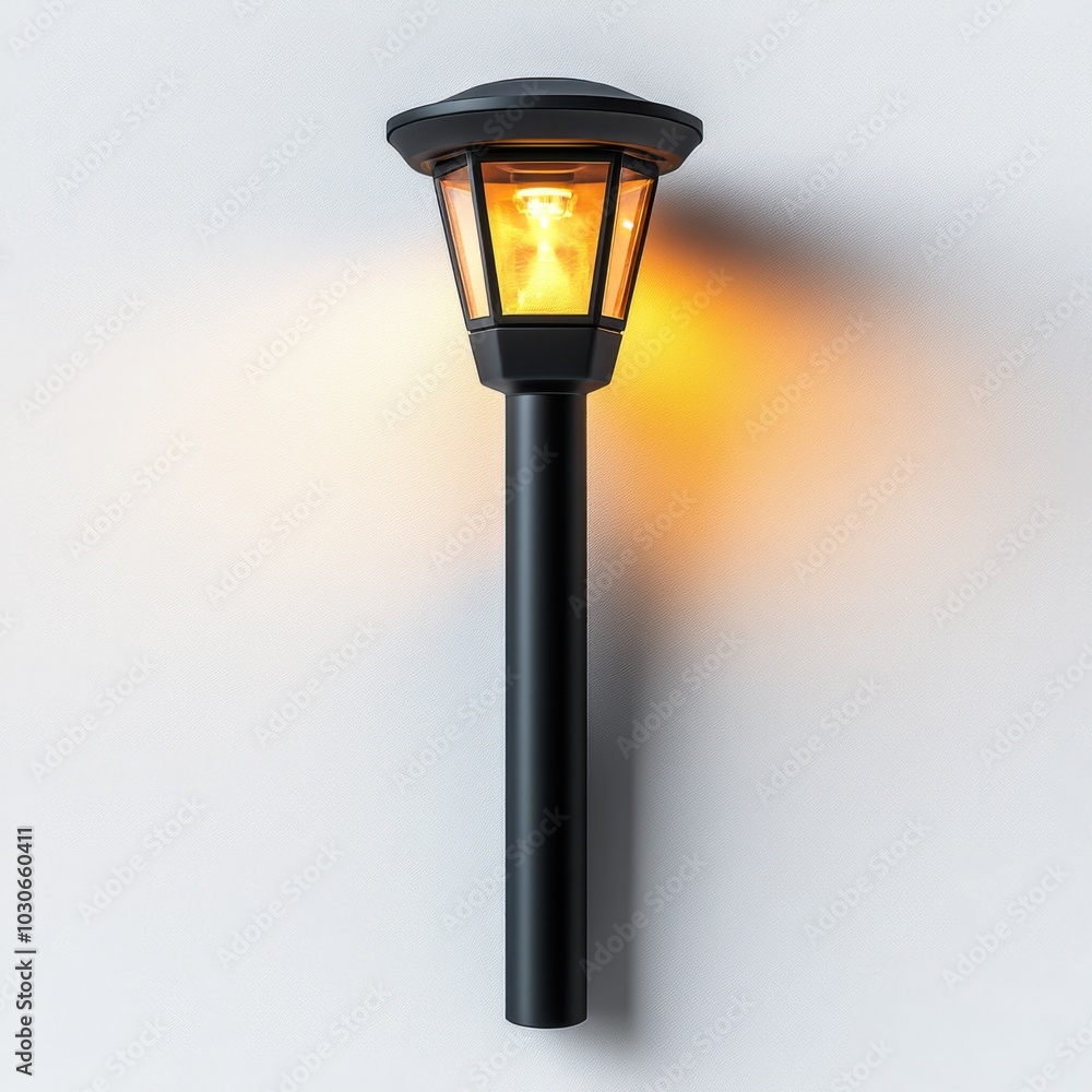Black metal outdoor lantern with warm light illuminating white wall at night Black metal outdoor lantern with warm light illuminating white wall at night