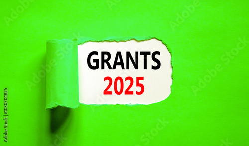 Planning grants 2025 new year symbol. Concept words Grants 2025 on beautiful white paper. Beautiful green paper background. Business grants 2025 new year concept. Copy space.