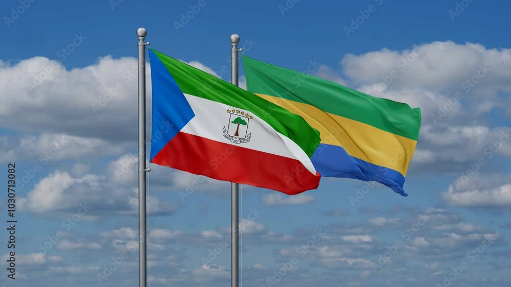 Gabon and Equatorial Guinea flags flying together, video concept of the relationship, two country relations concept Gabon and Equatorial Guinea flags flying together, video concept of the relationship, two country relations concept