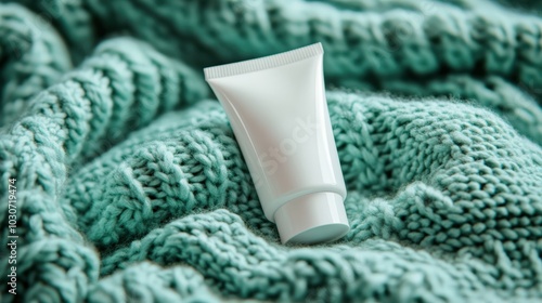 Minimalist Skincare Tube on Soft Wool Blanket