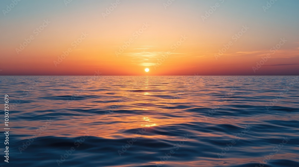 Obraz premium Quiet sunset over the calm waters of Lake Michigan, with room for copy in the sky