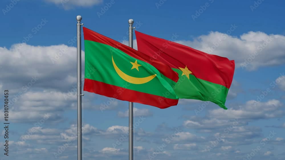 Burkina Faso and Mauritania flags flying together, video concept of the relationship, two country relations concept Burkina Faso and Mauritania flags flying together, video concept of the relationship, two country relations concept