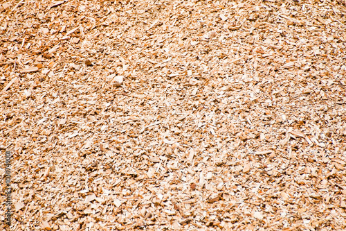 The photo shows a close-up of wood chips