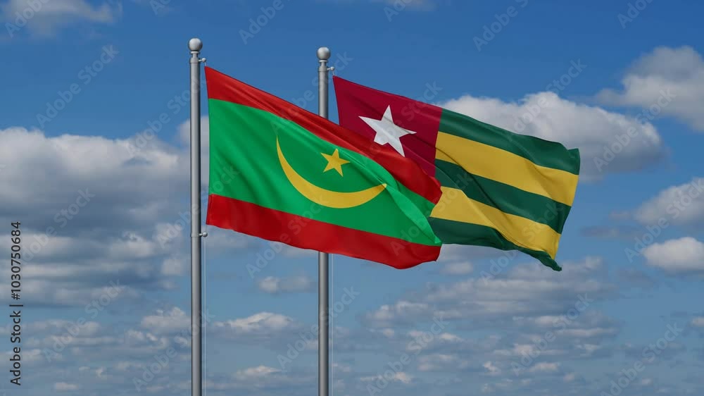 Togo, Togolese Republic and Mauritania flags flying together, video concept of the relationship, two country cooperation concept Togo, Togolese Republic and Mauritania flags flying together, video concept of the relationship, two country cooperation concept