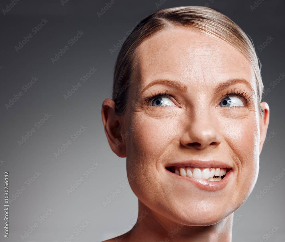 Beauty, biting lip and idea with woman in studio on gray background for facial cosmetics. Face, skincare and thinking with mature person on space at salon or spa for antiaging dermatology treatment Beauty, biting lip and idea with woman in studio on gray background for facial cosmetics. Face, skincare and thinking with mature person on space at salon or spa for antiaging dermatology treatment