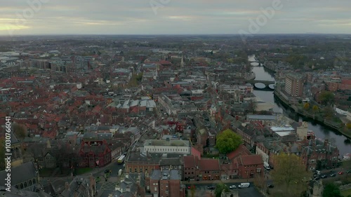 Wallpaper Mural Drone footage of York capturing the cityscape along the River Ouse during sunset in England, United Kingdom Torontodigital.ca