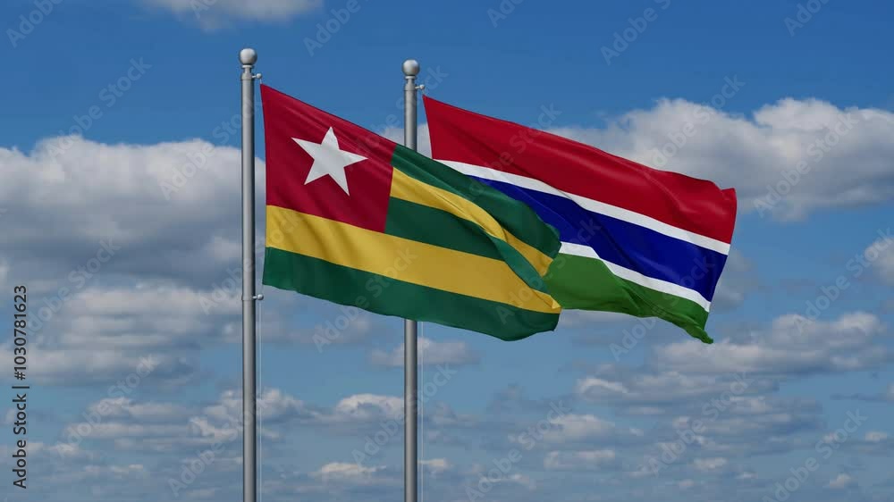 Gambia and Togo flags flying together, video concept of the relationship, two country relations concept Gambia and Togo flags flying together, video concept of the relationship, two country relations concept