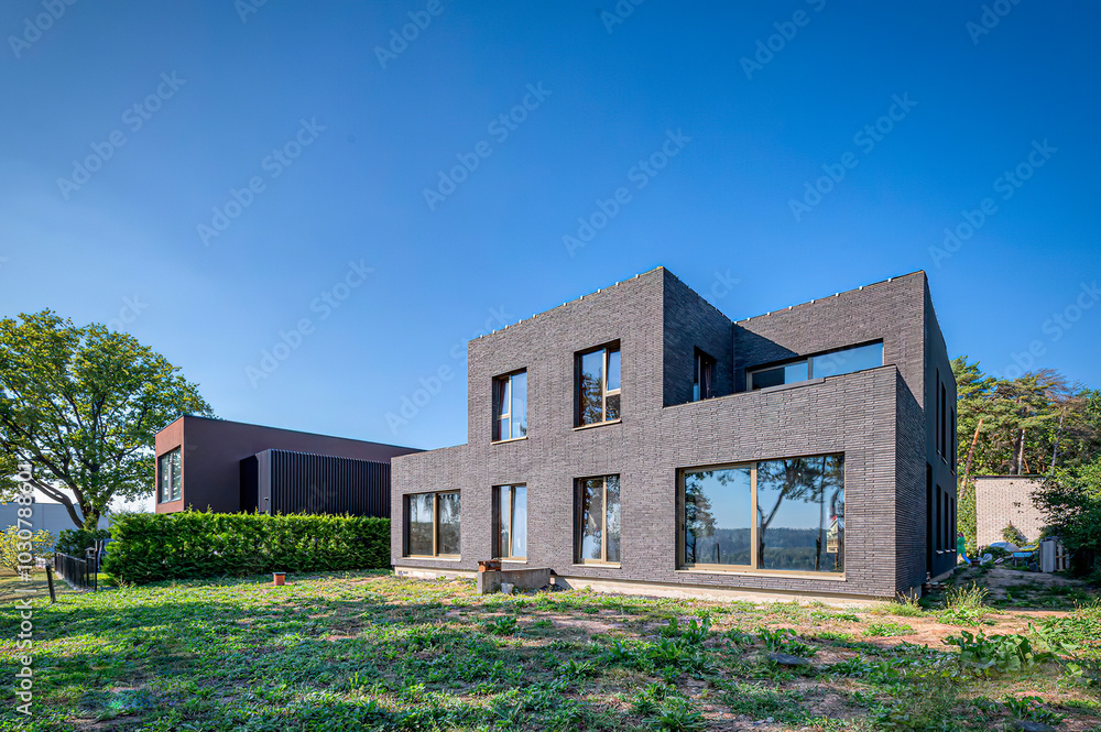 Modern luxury villa exterior in minimal scandinavian style, 3d render Modern luxury villa exterior in minimal scandinavian style, 3d render