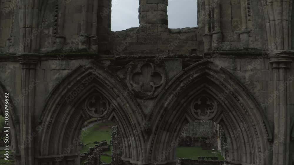 Drone shot of Rievaulx Abbey ruins with gothic architecture and scenic landscape in Helmsley, England, UK Drone shot of Rievaulx Abbey ruins with gothic architecture and scenic landscape in Helmsley, England, UK