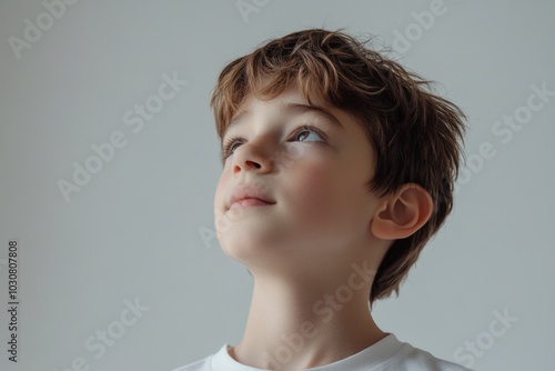 Boy gazing up at sky