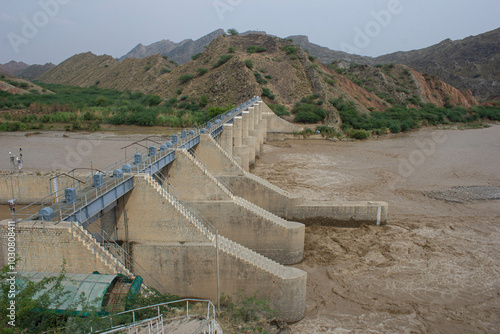 Dam on Kurrum river, Reservoir water of Kurram River, hydroelectric power plant, source using water stream, natural mountain resort, mountains, concept ecology, clean energy photo