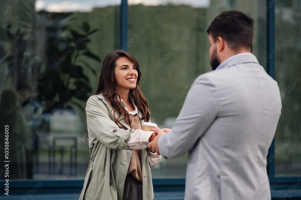 Business people talking and having coffee outside the office Business people talking and having coffee outside the office