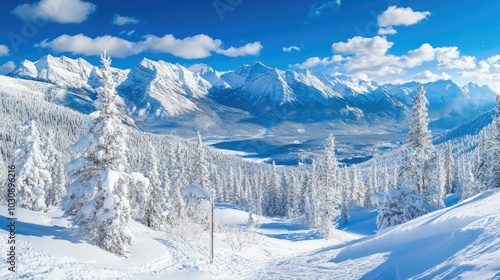 Wallpaper Mural Panorama of snow covered mountains with blue sky and clouds and snow covered trees Torontodigital.ca