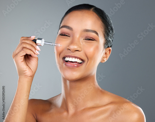 Woman, portrait and serum with beauty in studio for collagen treatment, skin hydration and skincare. Mockup, happy and cosmetics product with hyaluronic acid, retinol and wellness on gray background