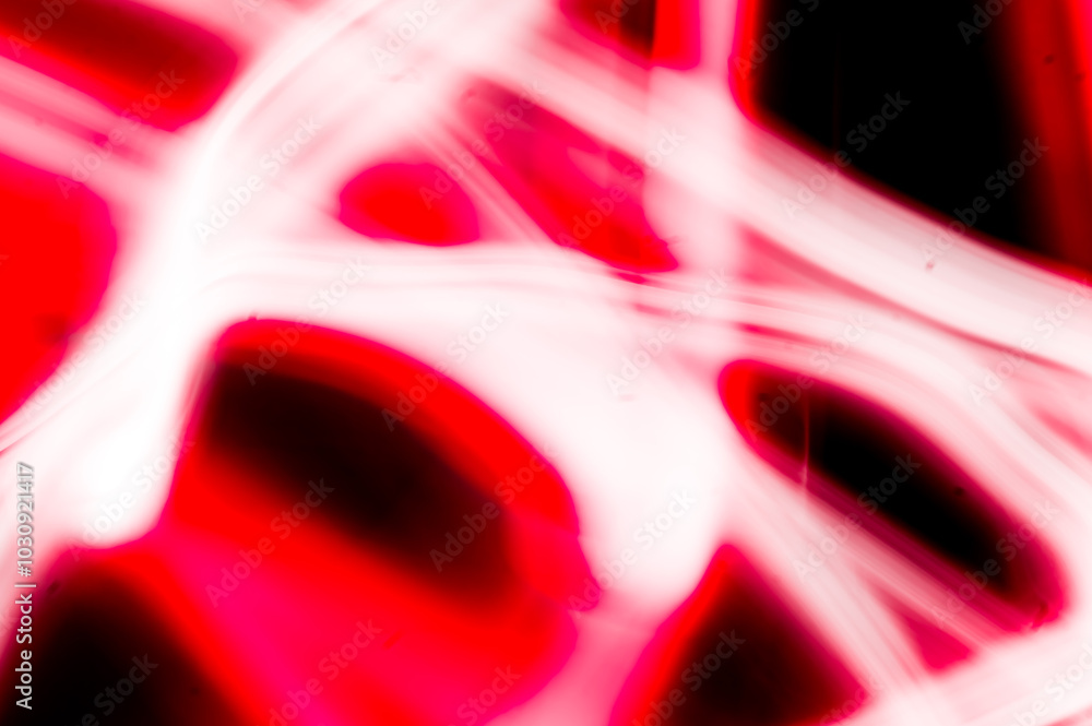 abstract image of dynamic movement of red and white color stripes on a dark background abstract image of dynamic movement of red and white color stripes on a dark background
