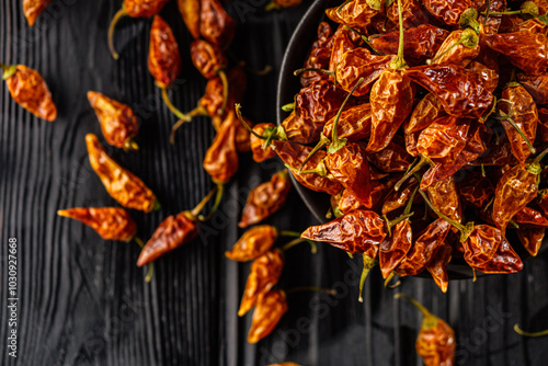 Assorted Dried Capsicum and Fresh Lemon Drop Chili Peppers Highlighting Aji Lemon and Yellow Chili photo