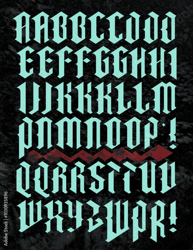 An uppercase gothic alphabet with angular diamond shaped characters and median spur alternates.
