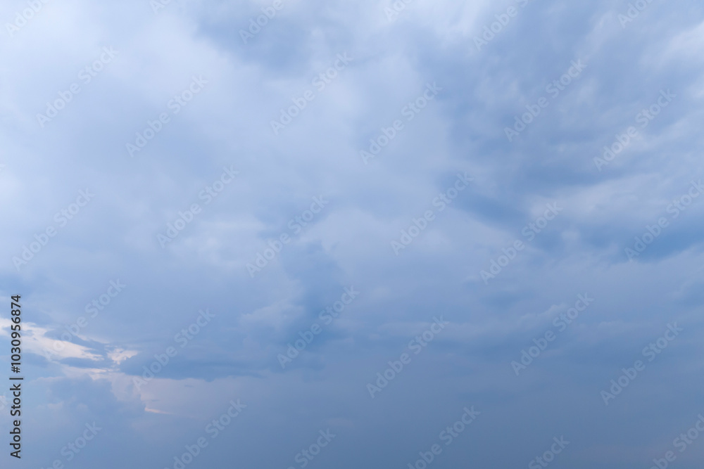 A serene view of a cloudy sky, showcasing various shades of blue and gray. Ideal for backgrounds, weather-related themes, or artistic projects. A serene view of a cloudy sky, showcasing various shades of blue and gray. Ideal for backgrounds, weather-related themes, or artistic projects.