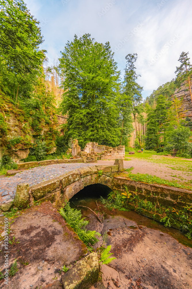 Ruins of water mill Dolsky mlyn in Bohemian Switzerland, Czech Republic. The place where Czech fairy tales are filmed Ruins of water mill Dolsky mlyn in Bohemian Switzerland, Czech Republic. The place where Czech fairy tales are filmed