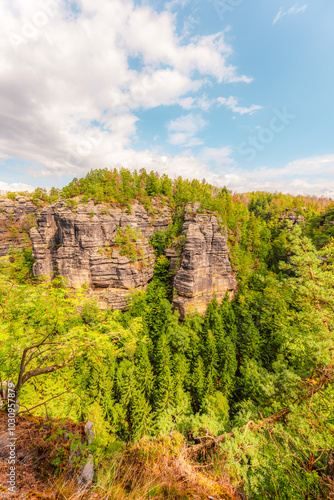 Hiking to pravcicka Brana (Pravcicka Gate) in Bohemian Switzerland National Park. Biggest natural arch in Europe photo