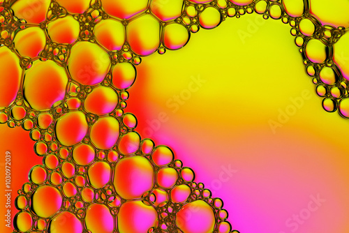 Macro close up of water bubbles with copy space on pink and yellow background