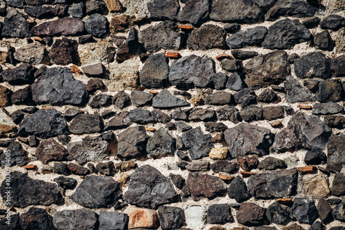 Old Volvic stone wall in Clermont Ferrand, Auvergne photo