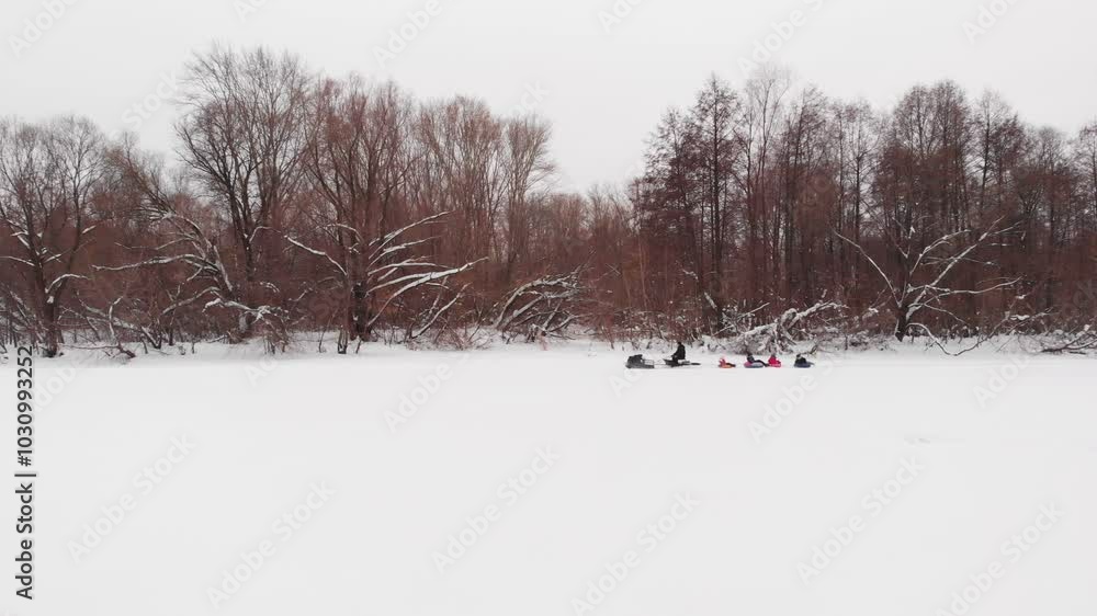 Riding a snowmobile Riding a snowmobile