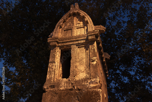 Ruined Kings Tomb in Kas, Turkey. Night view photo