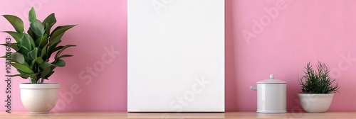 blank vertical canvas handing on pink wall in home living room photo