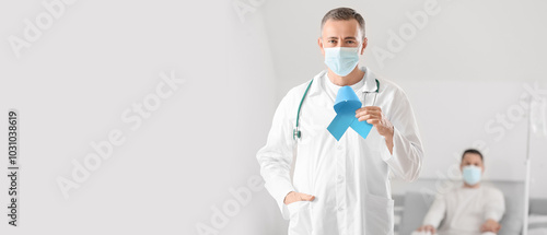 Oncologist with blue ribbon...
